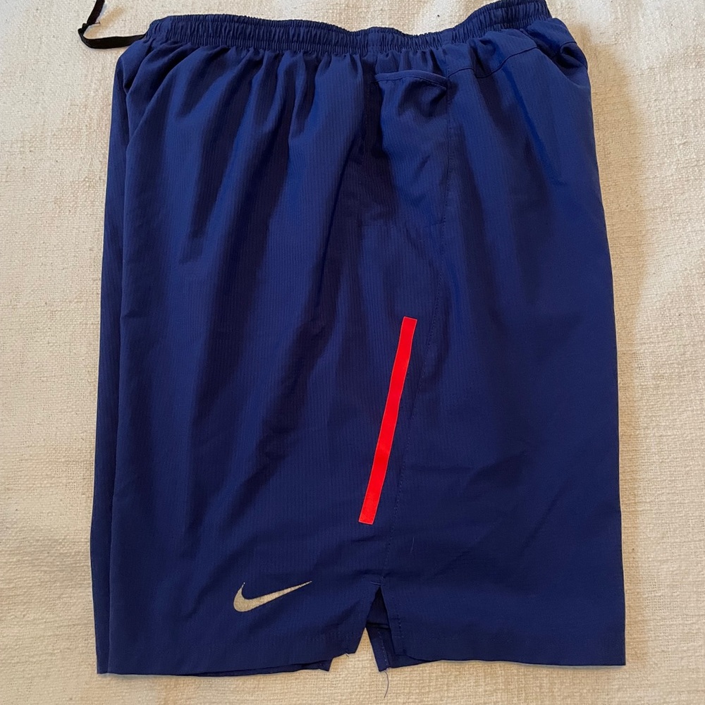 Blue Nike athletic shorts